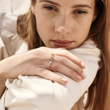 Rose gold stainless steel cutout open ring with diamond accents