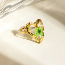 Gold stainless steel eternal flower ring with green pressed flower heart
