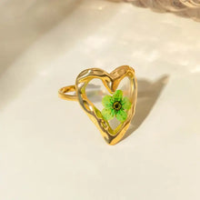 Gold stainless steel eternal flower ring with heart-shaped green inlay