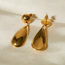 Shiny stainless steel teardrop dangle earrings with gold teardrops