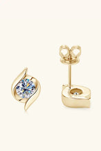 Pair of yellow gold stud earrings with brilliant round-cut diamonds