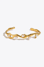 Gold tone cuff pearl open bracelet with inlaid synthetic pearls