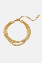 Gold triple-layered snake chain bracelet with adjustable clasp