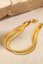 Gold triple-layered snake chain bracelet with adjustable clasp