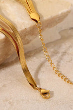 Gold triple-layered snake chain bracelet with adjustable clasp