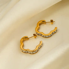 Gold wavy hoop earrings in stainless steel inlaid zircon square cut
