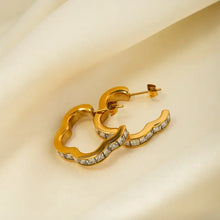 Gold heart-shaped wavy hoop earrings in stainless steel inlaid zircon