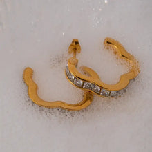 Gold wavy hoop earrings in stainless steel inlaid zircon square cut