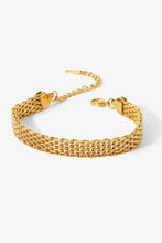 Gold wide chain bracelet with adjustable mesh, interlocking links, and lobster clasp