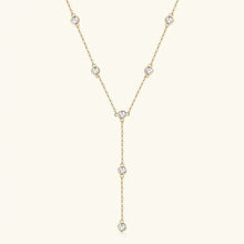 Elegant gold Y-shaped necklace with bezel-set round brilliant diamonds