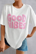White oversized Good Vibes round neck half sleeve T-shirt with pink text