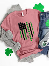 Pink Graphic Round Neck Short Sleeve T-Shirt with Distressed U.S. Flag and Shamrocks