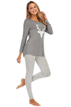 Gray graphic round neck long-sleeved pajama top with white deer head and matching striped leggings set