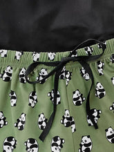 Olive green panda print pajama pants with elastic waistband and matching drawstrings in a graphic tee lounge set with sleeve length options