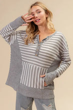 Gray and white striped long sleeve buttoned henley neck top for women