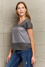 Striped gray and white V-neck top with regular sleeve length