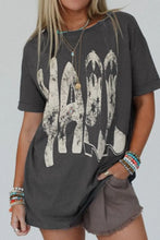Gray graphic tee with bracelets, featured in the Gray Graphic Tee with YALL and Cowboy Boot for Women
