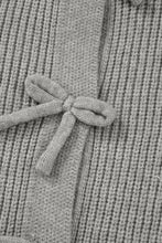 Gray knitted lace-up cardigan sweater with bow, ribbed cuffs and buttons