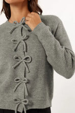 Gray lace-up cardigan sweater with bow, ribbed cuffs, and button details