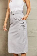 Gray high waist midi cargo skirt with belt loops and side flap pockets