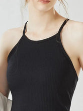 Black ribbed knit grecian neck cropped tank with chest pads and thin straps for stylish summer wear