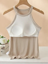 Beige and white two-piece grecian neck tank set with ribbed trim scalloped hem and built-in chest pads