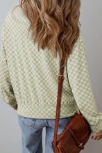 Green and white checkered cotton hoodie with drawstring, pockets, and leather crossbody bag