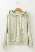 Green and white checkered cotton hoodie with drawstring hood and pockets