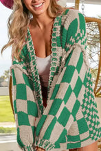 Green and white checkered long sleeve cardigan with pom-pom trim