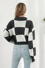 Green and White Checkered Sweater with Long Sleeve Length and Round Neck