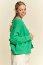 Green drop shoulder cardigan with relaxed fit and fringe details