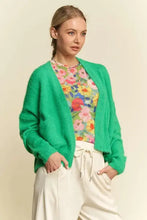 Green drop shoulder cardigan with relaxed fit and fringe details
