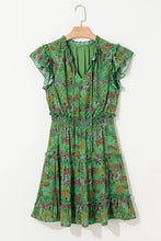 Green floral print tiered dress with ruffled sleeves and elastic waistband