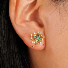 Ohrstecker aus goldfarbenem Moissanit mit grünen Marquise-Steinen und Perlen