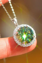 Sparkling 1 carat moissanite pendant with diamond halo on silver chain