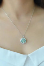 Green 1-carat moissanite halo pendant necklace with silver chain