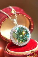 Green 2-carat moissanite halo pendant necklace with silver chain