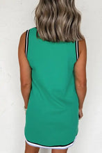Green sleeveless dress with black and white trim, machine wash cold