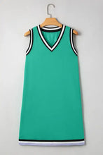 Green sleeveless dress with black and white trim, machine wash cold