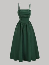 Green spaghetti strap polyester dress with ruched waist and flared skirt