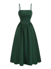 Dark green spaghetti strap polyester dress with ruched satin bodice