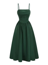 Dark green spaghetti strap polyester dress with ruched bodice