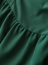 Green spaghetti strap polyester dress with ruffled elastic waistband