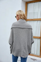 Grey long sleeve textured cardigan sweater with high collar