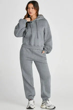 Grey oversized hoodie and jogger set full length with white sneakers
