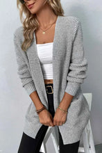 Gray textured knit cardigan with long sleeve length and pockets