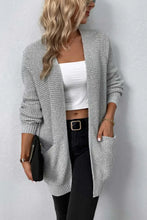 Grey textured knit cardigan with long sleeve length and pockets