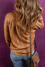 Rust-colored dropped shoulder long sleeve waffle-knit top in stretchy material