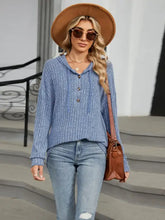 Women’s blue ribbed knit half button long sleeve hooded top