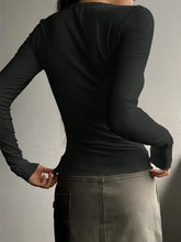 Black half button long sleeve ribbed t-shirt top